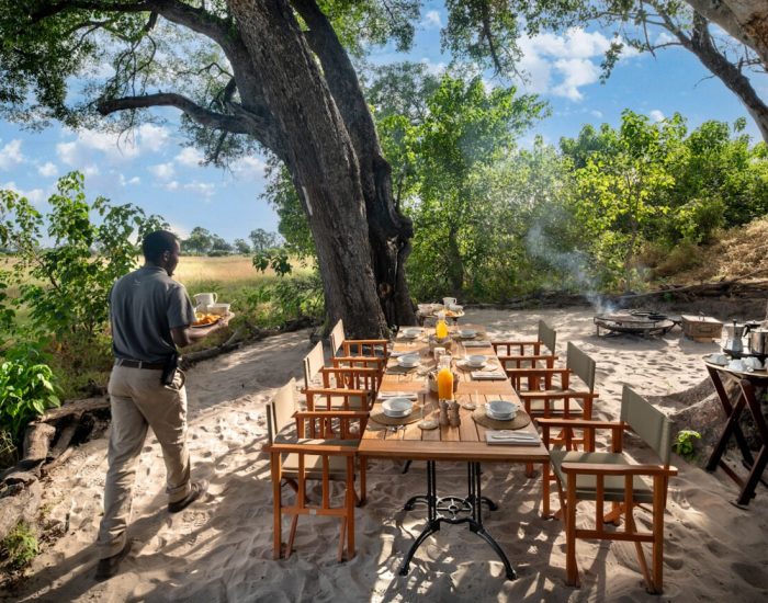 Botswana-Nxabega-Under-Canvas-main-guest-area-boma-breakfast-butler-