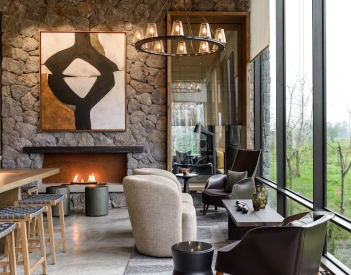 Kwitonda_Main_Lounge_Area_with_Bar_Deli__white_sofa_and_large_windows_ Kiliclimb Safaris