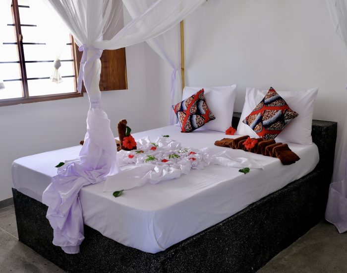 Nyumbani-Residence-first-bedroom-double-bed - Kiliclimb Africa Safaris