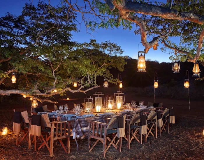 Pamu_Bush_Dining_Experience_Dinner_under_trees_lanterns_Micky_Hoyle - KILICLIMB SAFARIS