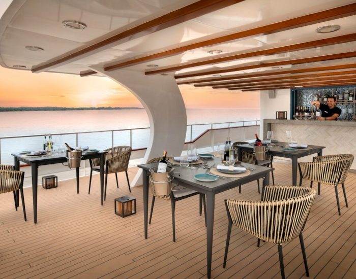 South-America-Ecuador-Galapagos-Galapagos-Explorer-outdoor-dining-area-and-bar-deck-3-crew-