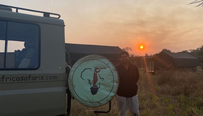 Sunset serengeti with a safari jeep