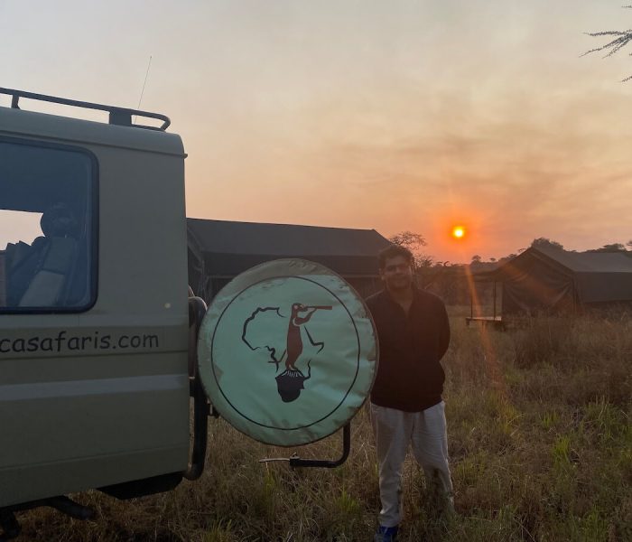 Sunset serengeti with a safari jeep