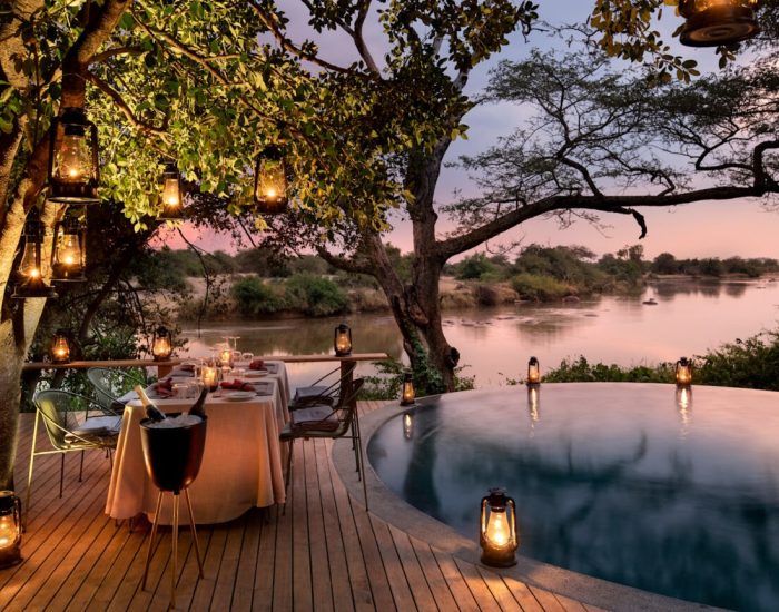 Tanzania-Grumeti-Serengeti-River-Lodge-Experiences-Guest-Delight-Pool-dinner