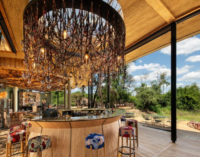 Tanzania-Grumeti-Serengeti-River-Lodge-Guest-Area-bar-with-river-vi