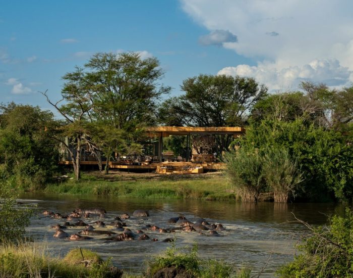 Tanzania-Grumeti-Serengeti-River-Lodge-Guest-Area-exterior-with-hippo-pod_