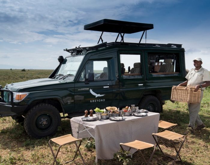 Tanzania-Serengeti-Under-Canvas-SUC-Experience-Bush-lunch-picnic-with-branded-vehicle-1536x1026
